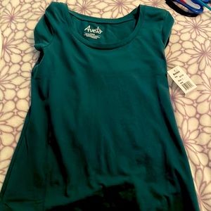 This green shirt has never been worn and it still has a tag on